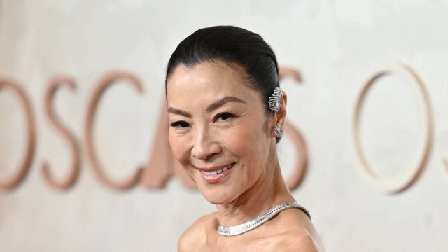 Michelle Yeoh, 63, reveals toned legs on beach getaway with husband, 80, for third wedding anniversary