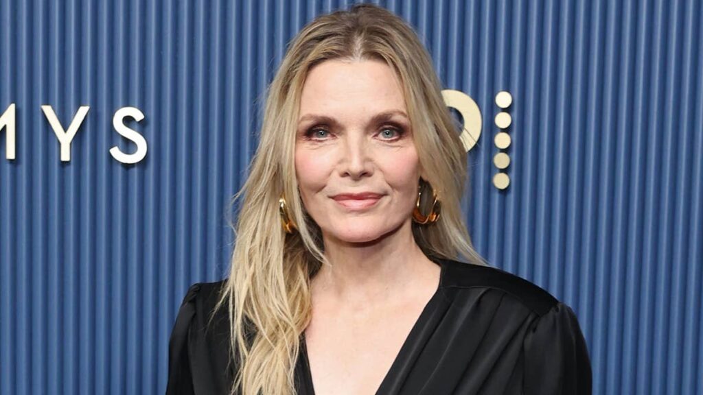 Michelle Pfeiffer stuns in slinky gown and larger-than-life hoops with age-defying appearance