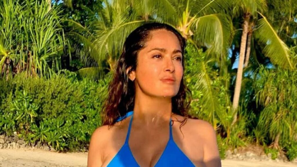 Salma Hayek, 60, stuns in topless beach photos as she enjoys naked swim