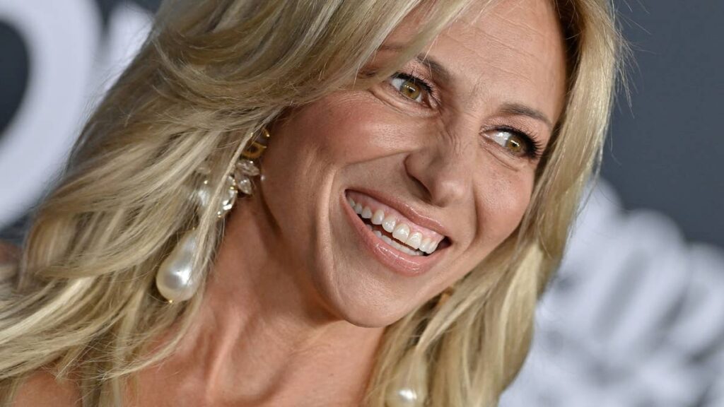 Debbie Gibson shows off toned legs in tiny shorts and high heels to celebrate 56th birthday in fierce new video