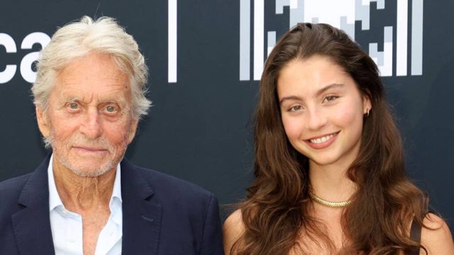 Michael Douglas, 81, holds hands with his daughter Carys, 23 in stunning red carpet appearance