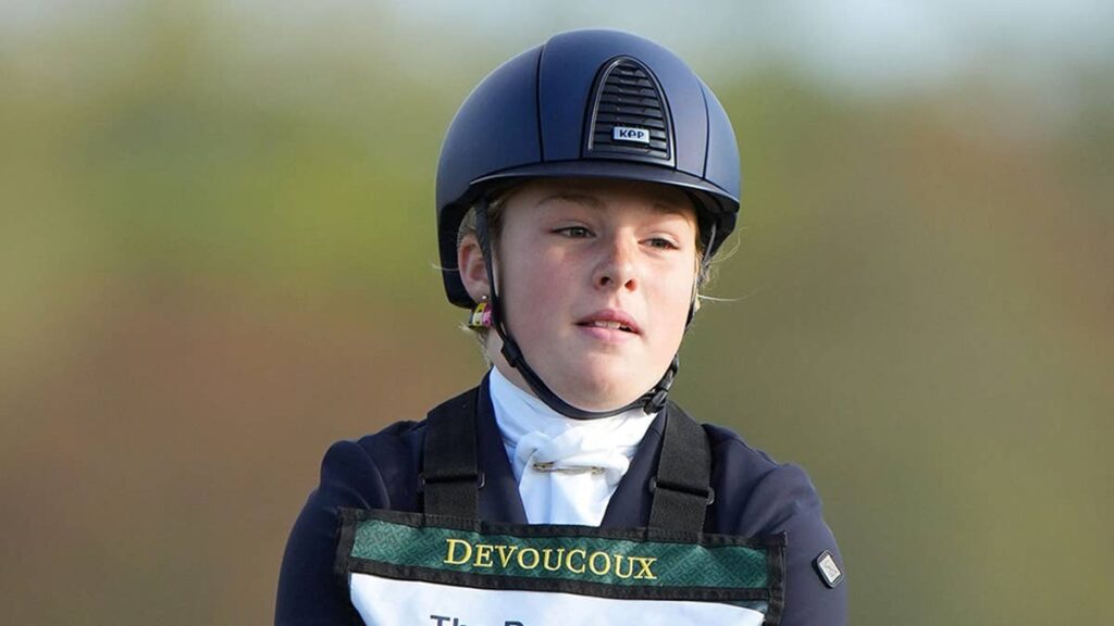 Mia Tindall is the mirror image of her mum Zara Tindall as she gets into the saddle at horse riding competition