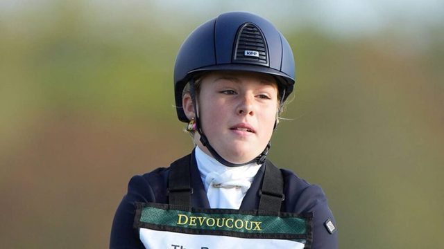 Mia Tindall is the mirror image of her mum Zara Tindall as she gets into the saddle at horse riding competition