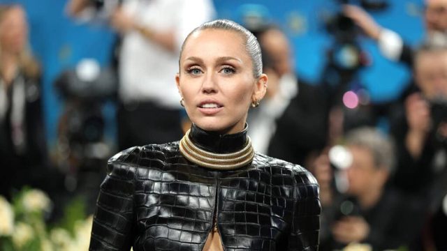 Miley Cyrus sizzles in daring ‘naked’ lace dress at wild party