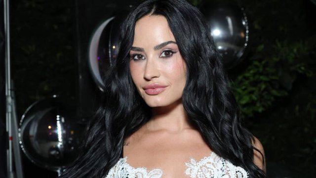 Tattooed Demi Lovato sizzles as she shows off killer abs in tiny string bikini