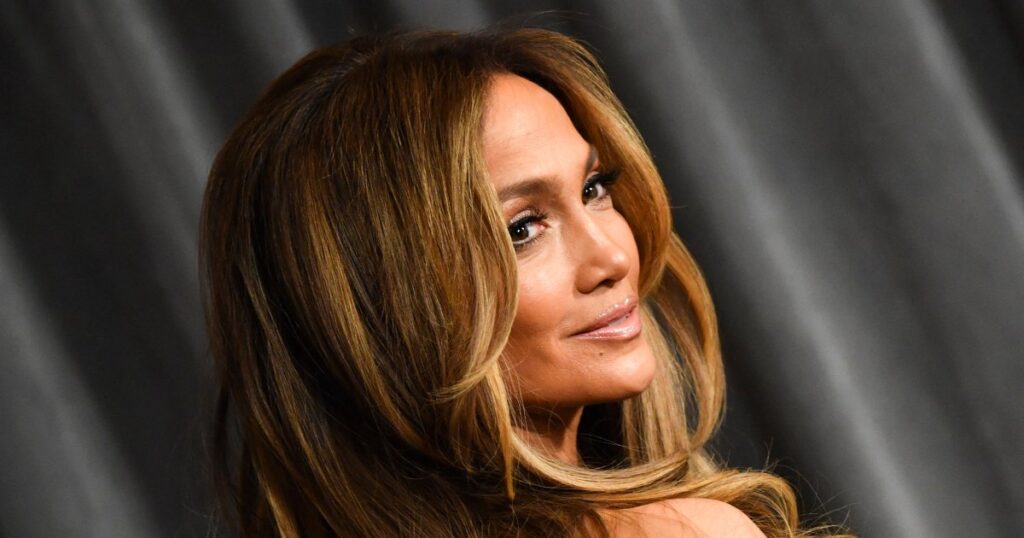 Jennifer Lopez Solved Our Transitional Wardrobe Woes With a Crisp, $36 Shirtdress Style