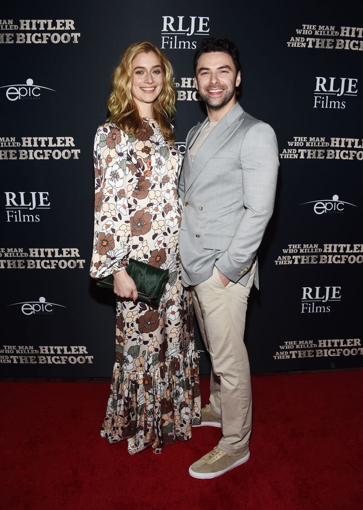 Caitlin Fitzgerald and Aidan Turner arrive at RLJE Films' "The Man Who Killed Hitler And Then Bigfoot" premiere at ArcLight Hollywood