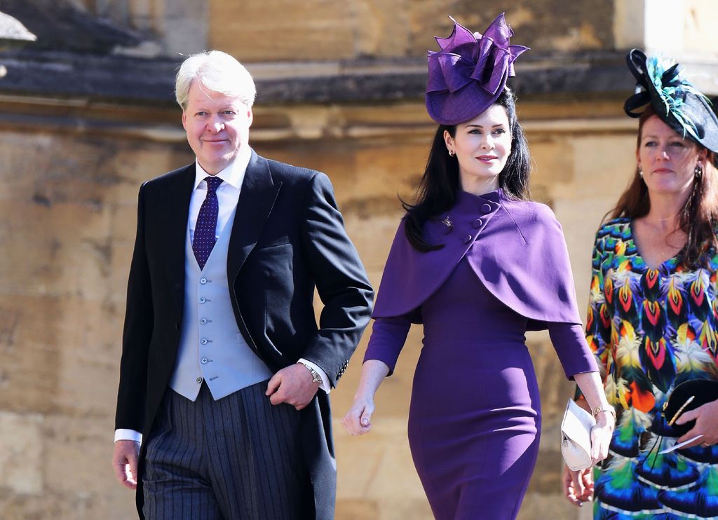 Charles Spencer, 9th Earl Spencer (L) and his wife, Karen Spencer arrive for the wedding ceremony of Britain's Prince Harry, Duke of Sussex and US actress Meghan Markle 