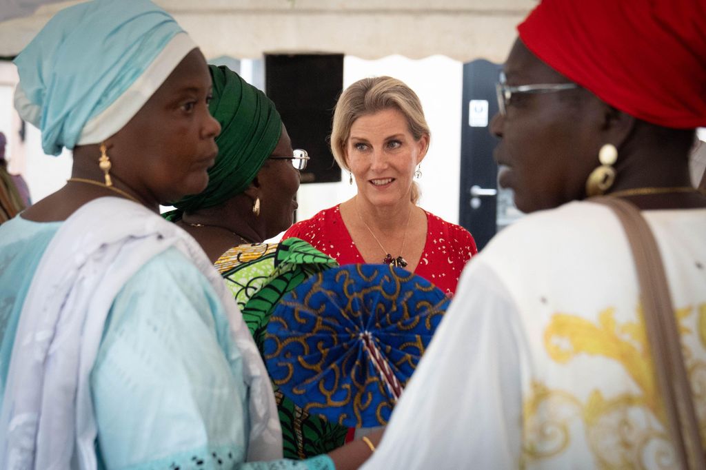 The Duchess of Edinburgh speaking to women in traditional African dress