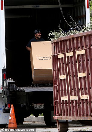 The man was seen taking a large box into the truck