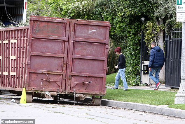 Less than an hour later Sharon was seen getting into a car, leaving the movers to it as they loaded various items into the truck