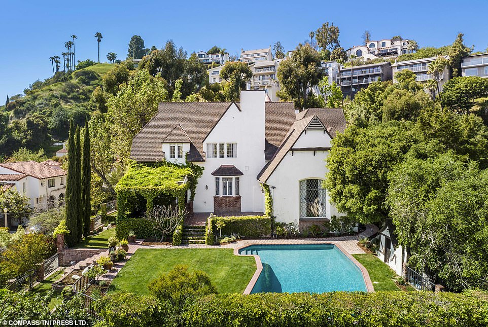 The gorgeous backyard includes a pool, well-manicured cypress trees, brick detailing, and a small play cottage that Disney built and gave to his daughters on Christmas in 1937. The property sits on about one acre of land, a larger-than-average plot for the area