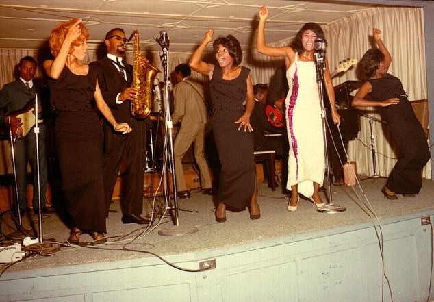 By this point their platonic relationship had turned romantic, and Tina became pregnant with their son, Ronnie, born in October 1960. Pictured: Ike & Tina Turner perform onstage in 1964 in Dallas Fort Worth, Texas