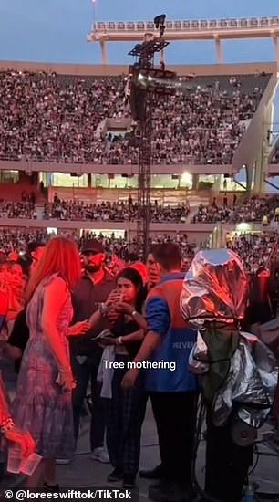 One girl was seen pounding down water inside the venue as fans battled blistering heat and dehydration