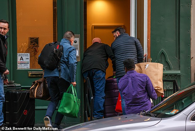 Staff carried her luggage into her New York apartment. Within an hour of reaching home, Taylor had gone to the Dogpound gym to work out