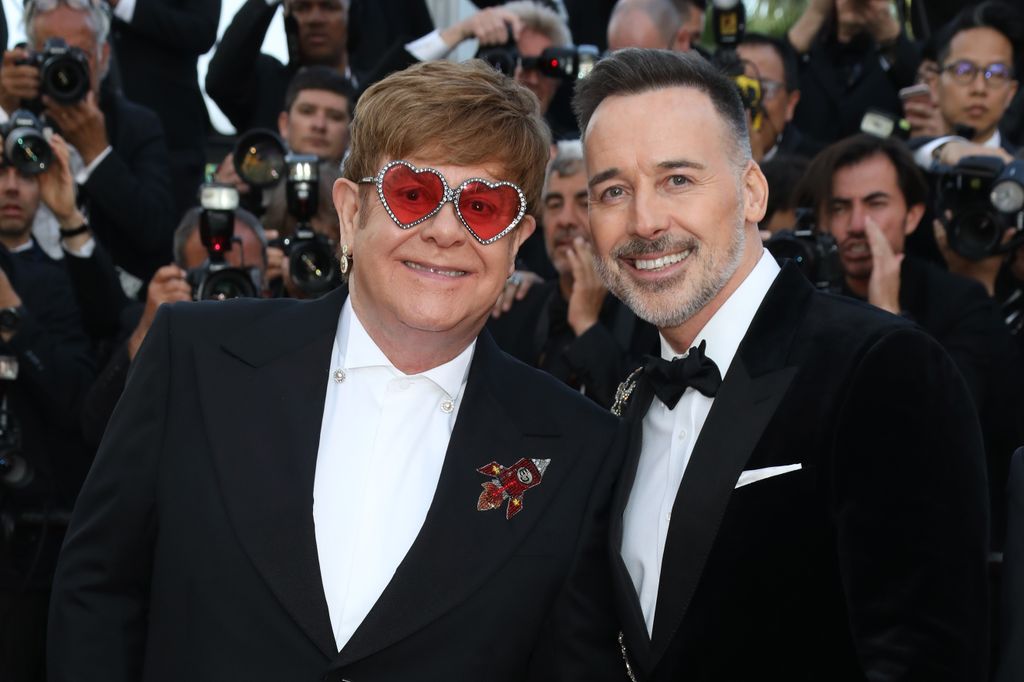 Elton John and David Furnish attend the screening of "Rocket Man" during the 72nd annual Cannes Film Festival on May 16, 2019