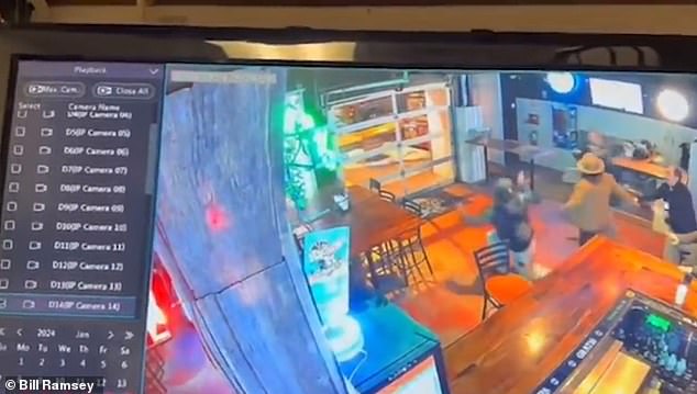 The agent responds by shoving the Famous Friends singer so hard he tumbles backwards