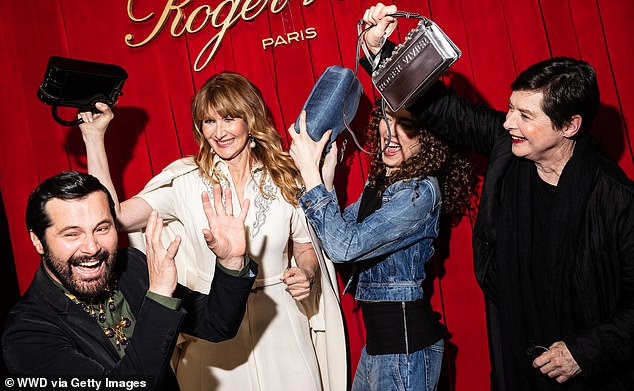 Eventually they were all joined by showbiz icon Isabella Rossellini, who threw herself into the spirit of the occasion and mugged for the camera with the others