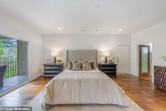 The all-new master suite is different from Steve-O's old bedroom that consisted of a bed, dark colors and a massage chair. This suite now features light colors and modern furniture with a clearer view from the private balcony. If one looks close enough, they can see some of the other houses near the Hollywood sign from the balcony