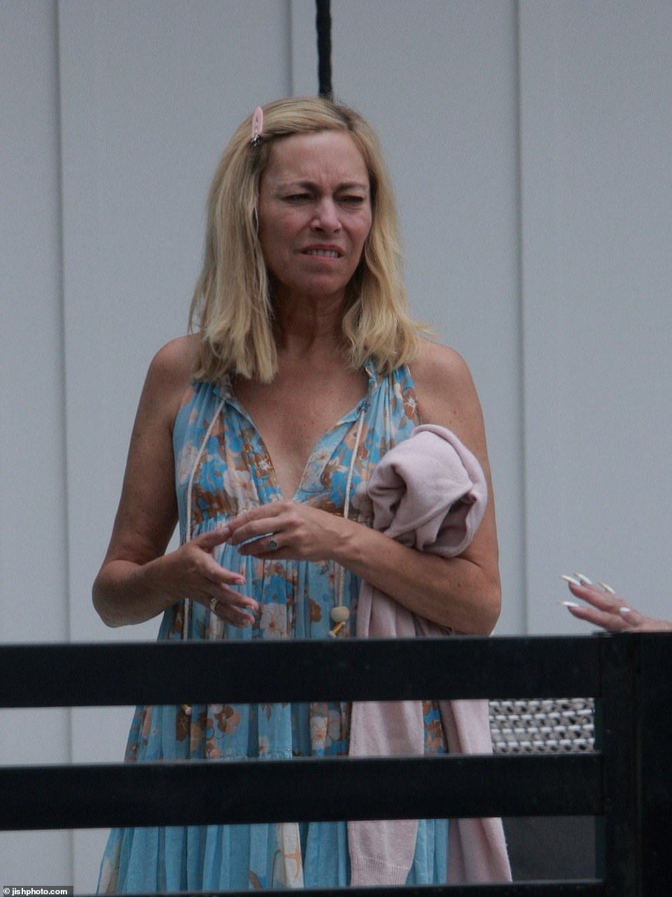 Jennifer Tilly, 65, could seen showing photos from her phone to Garcelle, with Sutton, 52, interrupting saying, 'Oh no, I hate that picture, don't! I mean, I had just gotten off the flight I was so bloated I was retaining water, I mean I think I weighed 137 and I weigh 112 now'