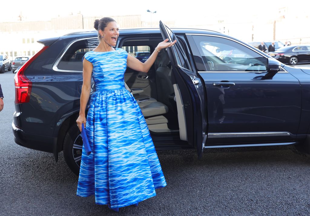 Crown Princess Victoria waving exiting car