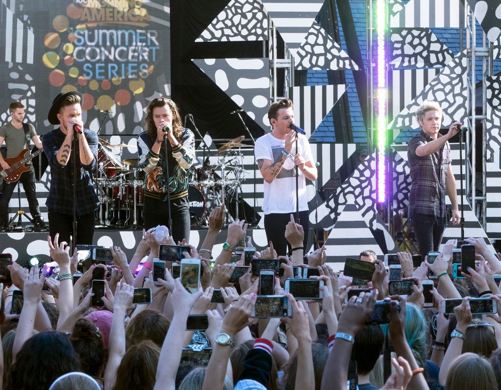 Members of One Direction performing in New York