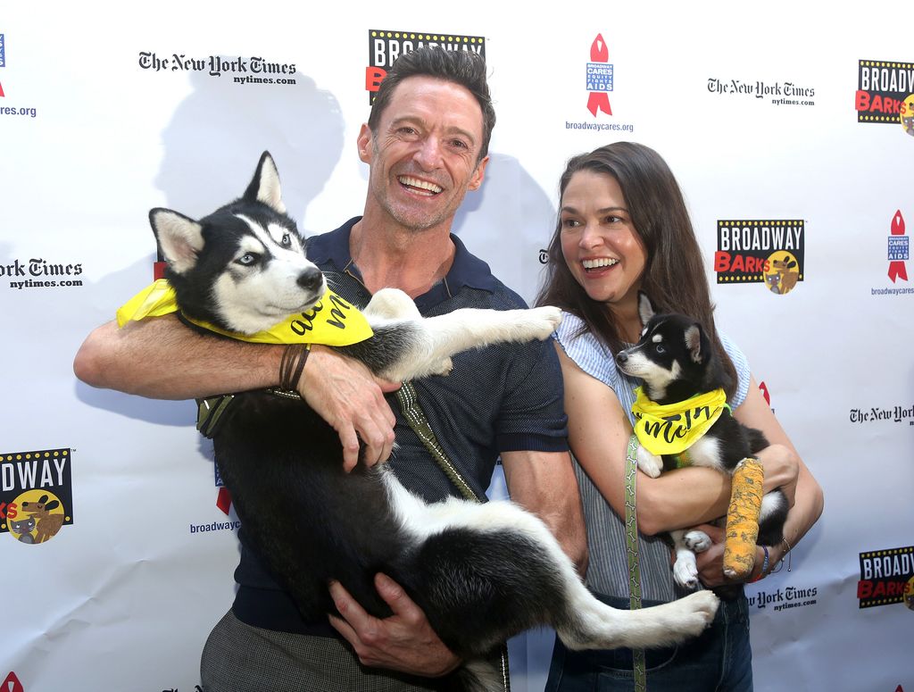 Hugh Jackman and Sutton Foster pose at 2022 Broadway Barks at Shubert Alley on July 09, 2022 in New York City.