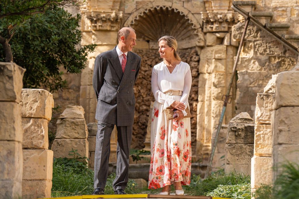 The couple shared a sweet moment as they toured the gardens