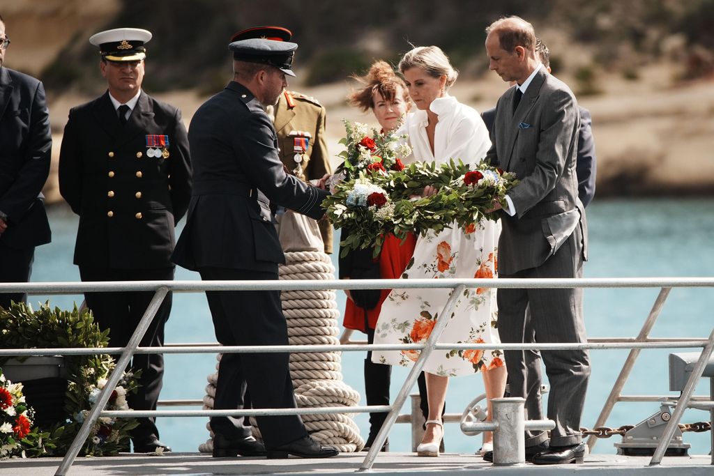 Sophie dropping wreaths on boat