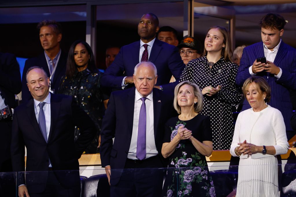 Democratic vice presidential candidate Minnesota Gov. Tim Walz, Minnesota First Lady Gwen Walz, Hope Walz, and Gus Walz attend the first day of the Democratic National Convention at the United Center on August 19, 2024