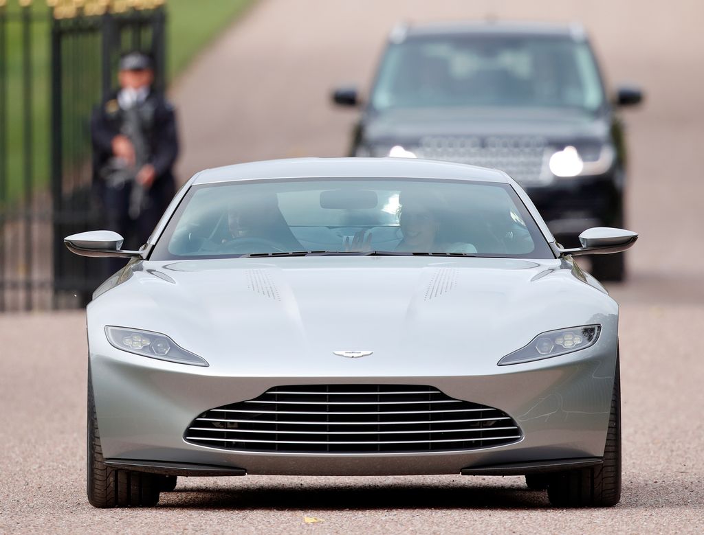 Jack Brooksbank and Princess Eugenie drive out of Windsor Castle