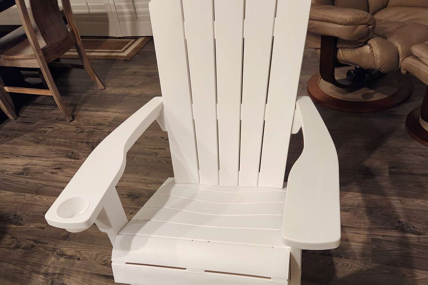 The Keter Alpine Adirondack Chair on wood