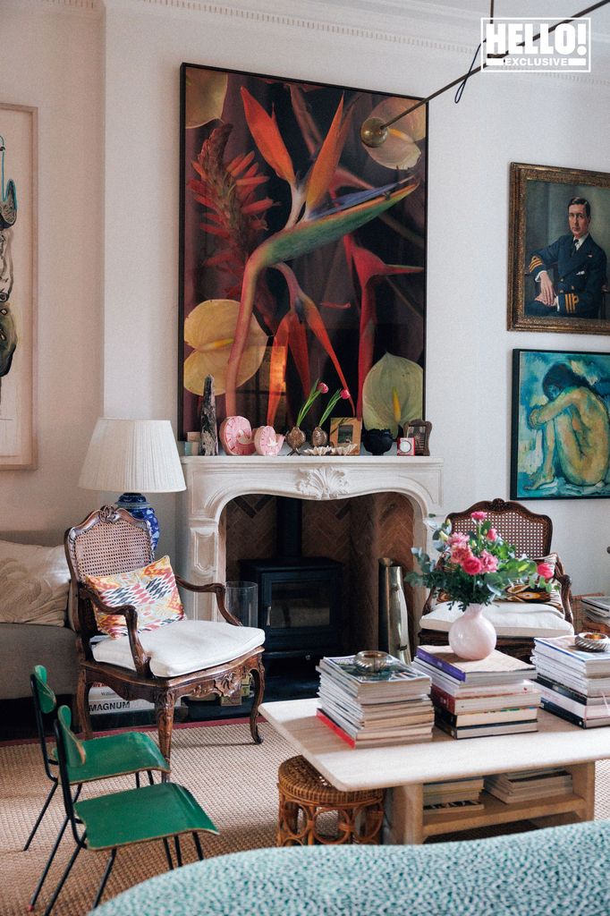 Nina Litchfield's living room at Notting Hill home with colourful artwork and chairs 