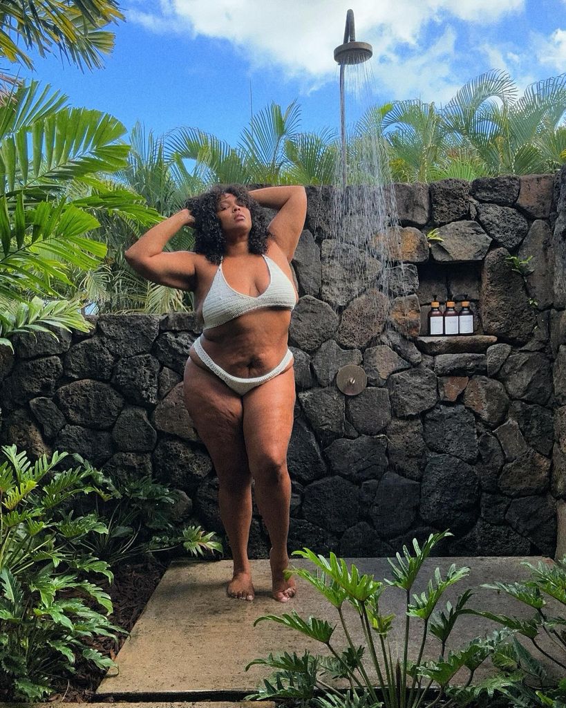 lizzo wearing gray bikini