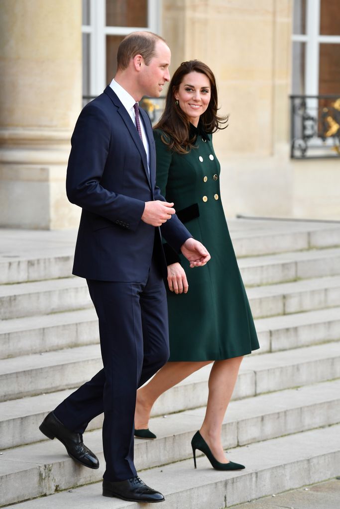 couple walking down steps