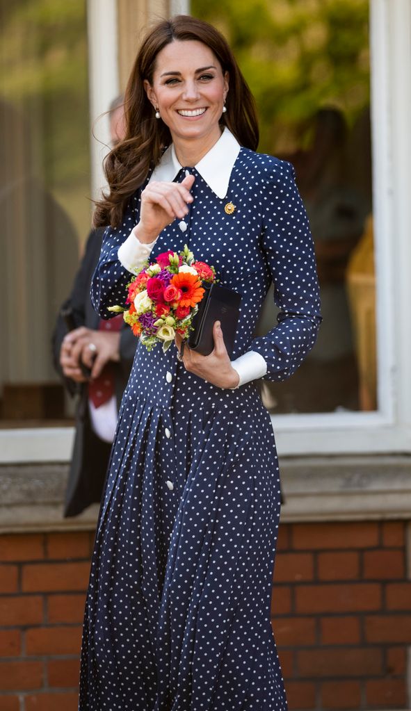 Princess Kate visits the D-Day exhibition at Bletchley Park on May 14, 2019 in Bletchley, England wearing an Alessandra Rich dress