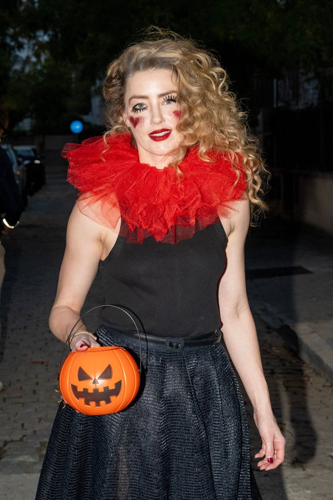 Amber Heard Celebrates Hallowen With Her Daughter. 31 Oct 2024 