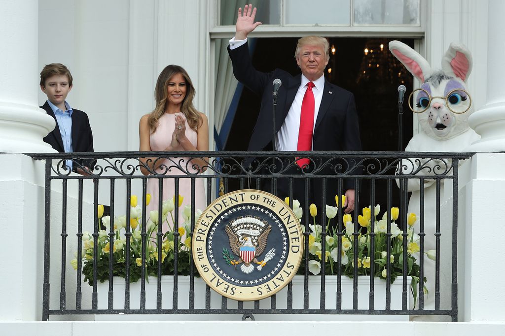 Donald and Melania Trump in the White House with their son Barron