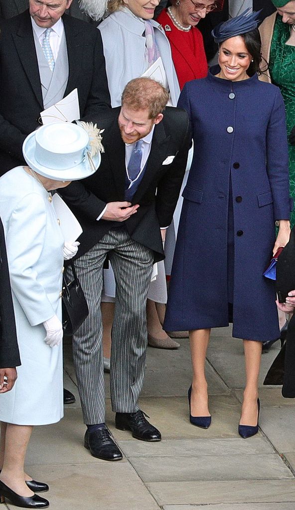 Harry and Meghan with Elizabeth II at Princess Eugenie's wedding, 2018