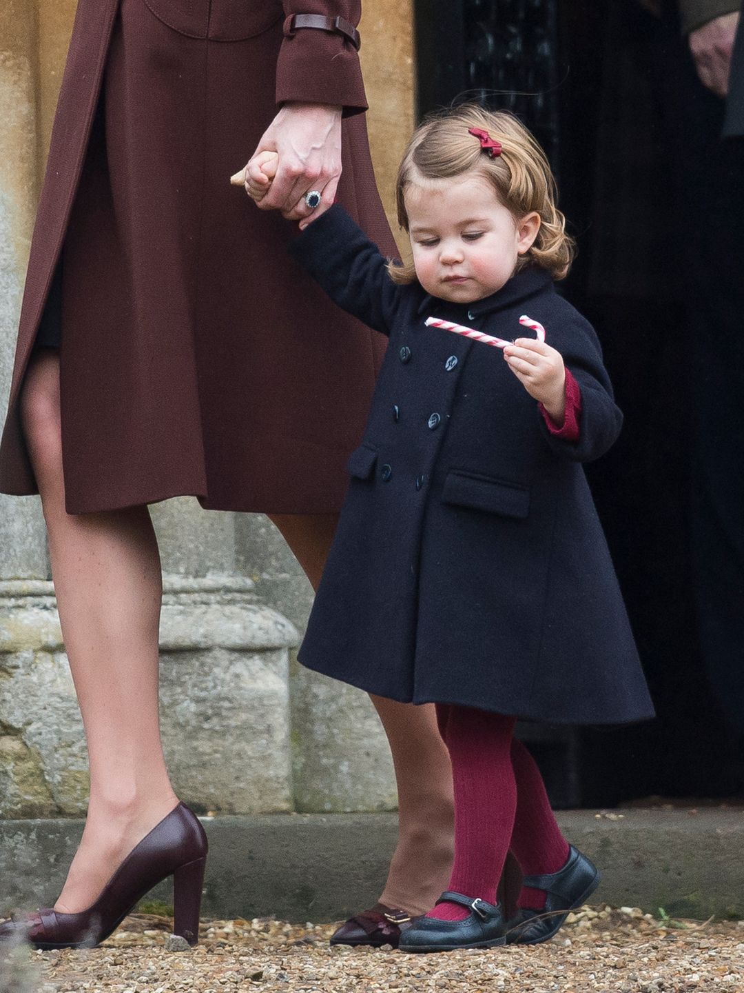 princess charlotte eating candy cane