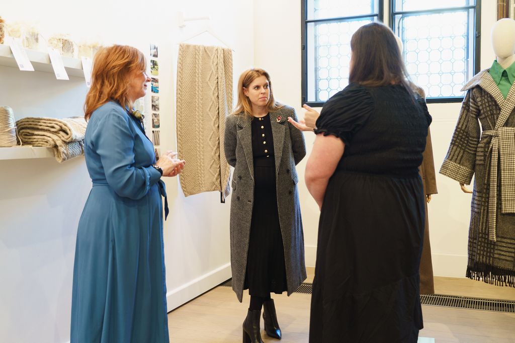 Princess Beatrice talking to three women at textiles exhibition