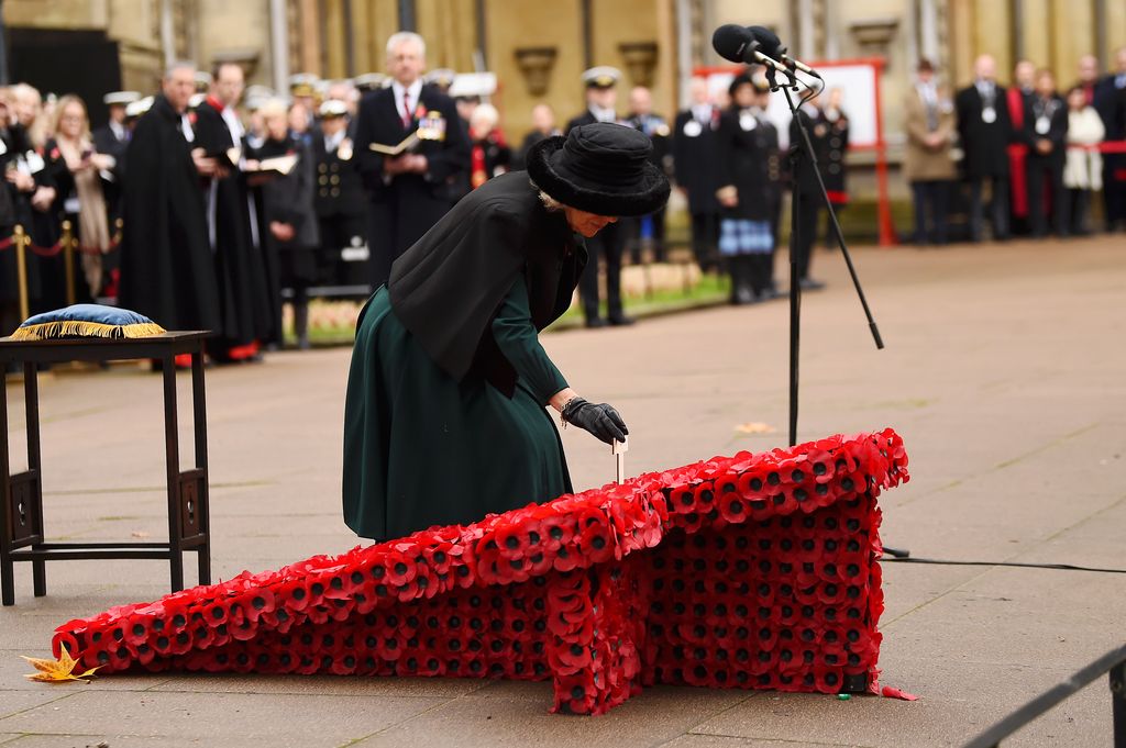 Queen Camilla places cross at 95th Field of Remembrance