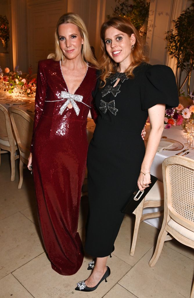 Alice Naylor-Leyland and Princess Beatrice in bow-adorned dresses