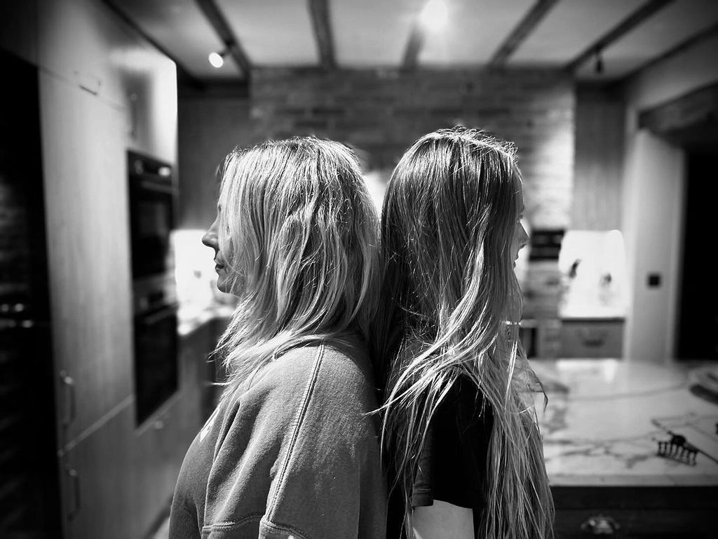 Georgia Tennant and her daughter, Olive, in their kitchen