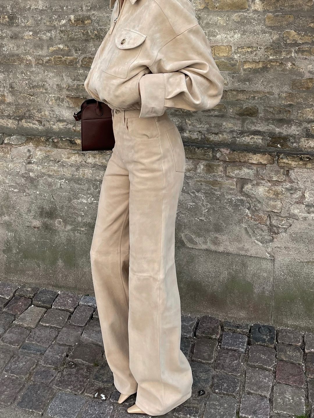 Elsa Hosk styles suede trousers and a matching jacket together on her Insatgram