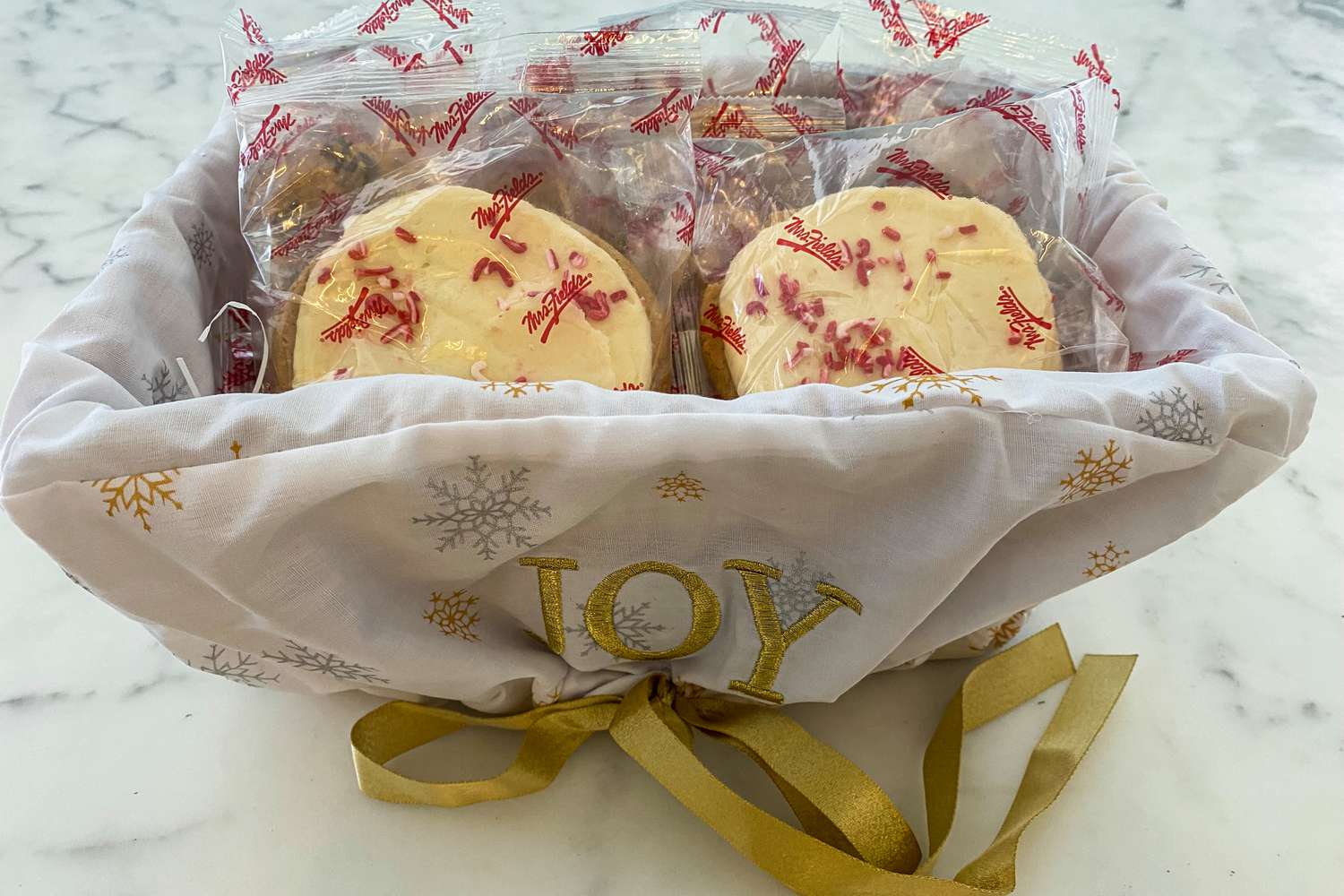 A Mrs. Fields Share the Joy Basket on a counter