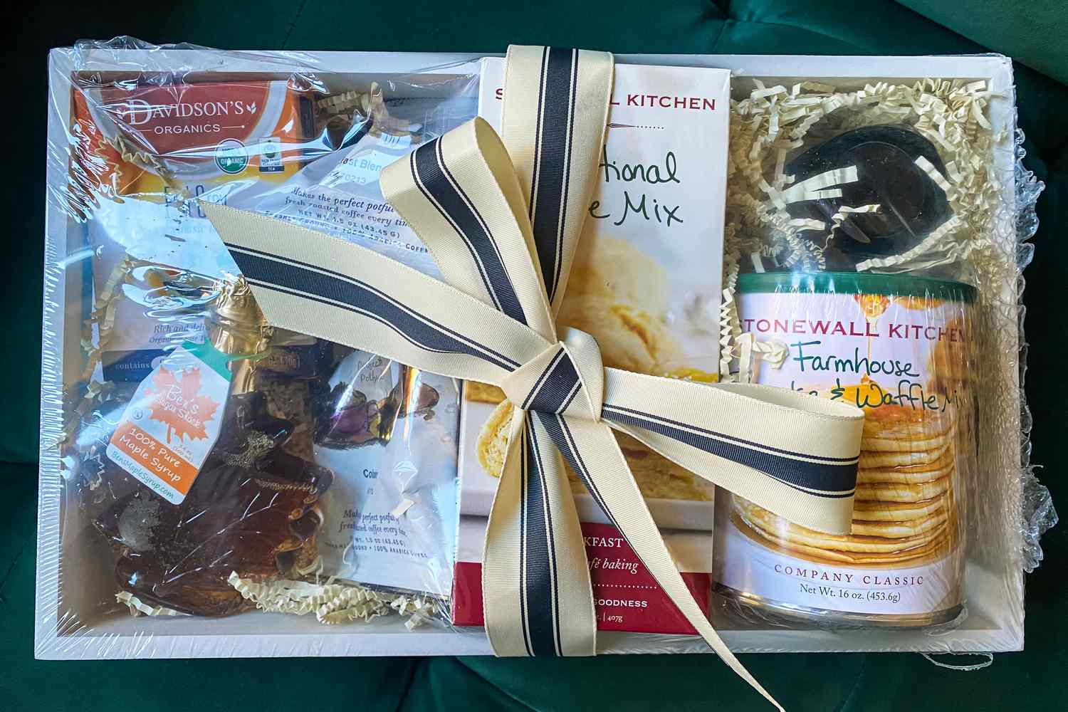 A wrapped GourmetGiftBaskets New England Breakfast Gift Basket Classic