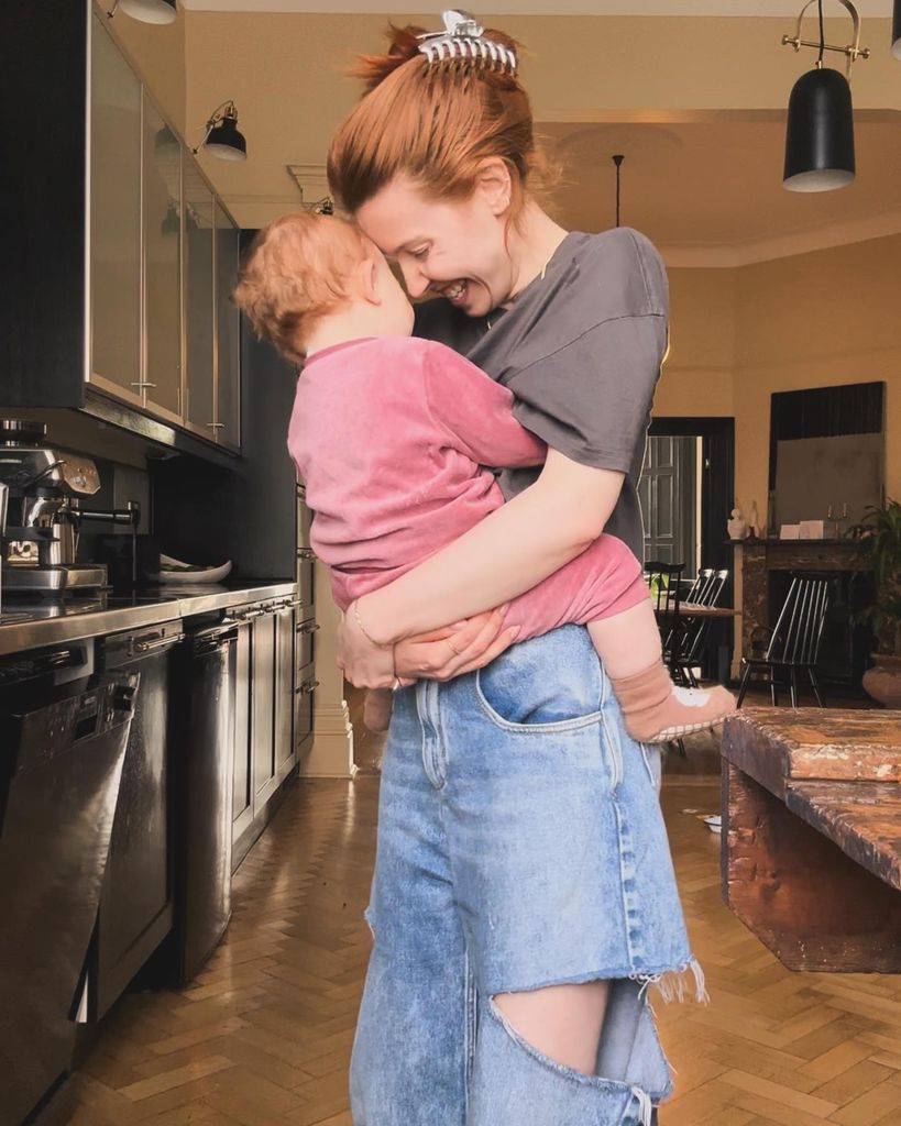 mother with daughter in kitchen