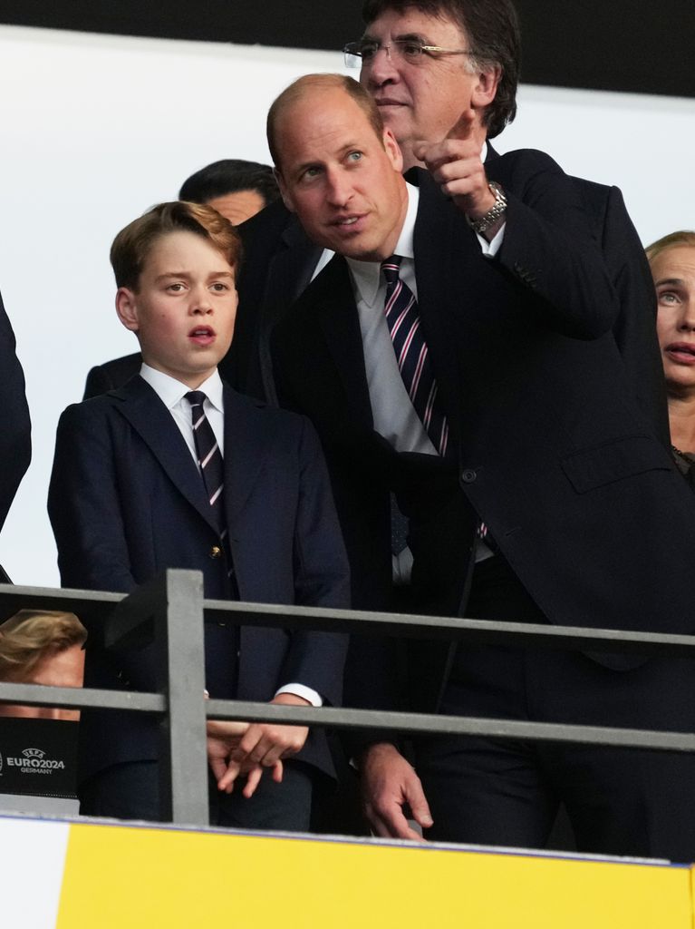  Prince George and Prince William watching football