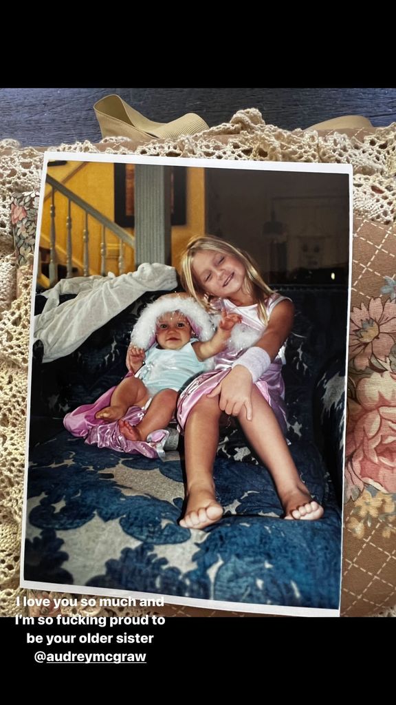 Baby Audrey McGraw sits alongside her older sister Gracie McGraw